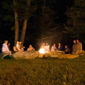 Group gathered around the bonfire.